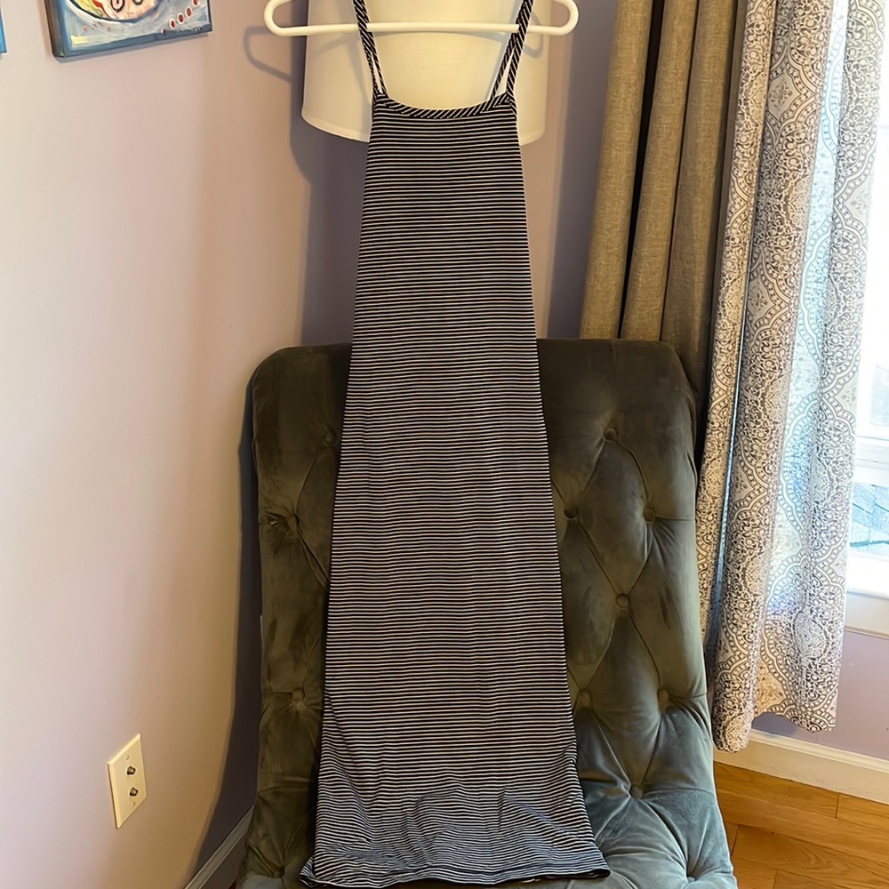 Floor length brown/white stripped polyester/spandex dress.